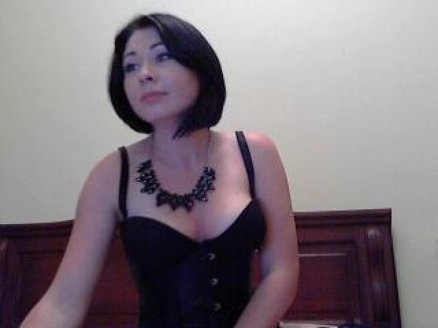 DeluxeBaby Teen Shaved Pussy Large Tits Green Eyes Webcam Webcam Model